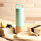Set aus Thermosflasche und Kaffeebecher